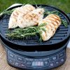 Griddle outdoors with Chicken